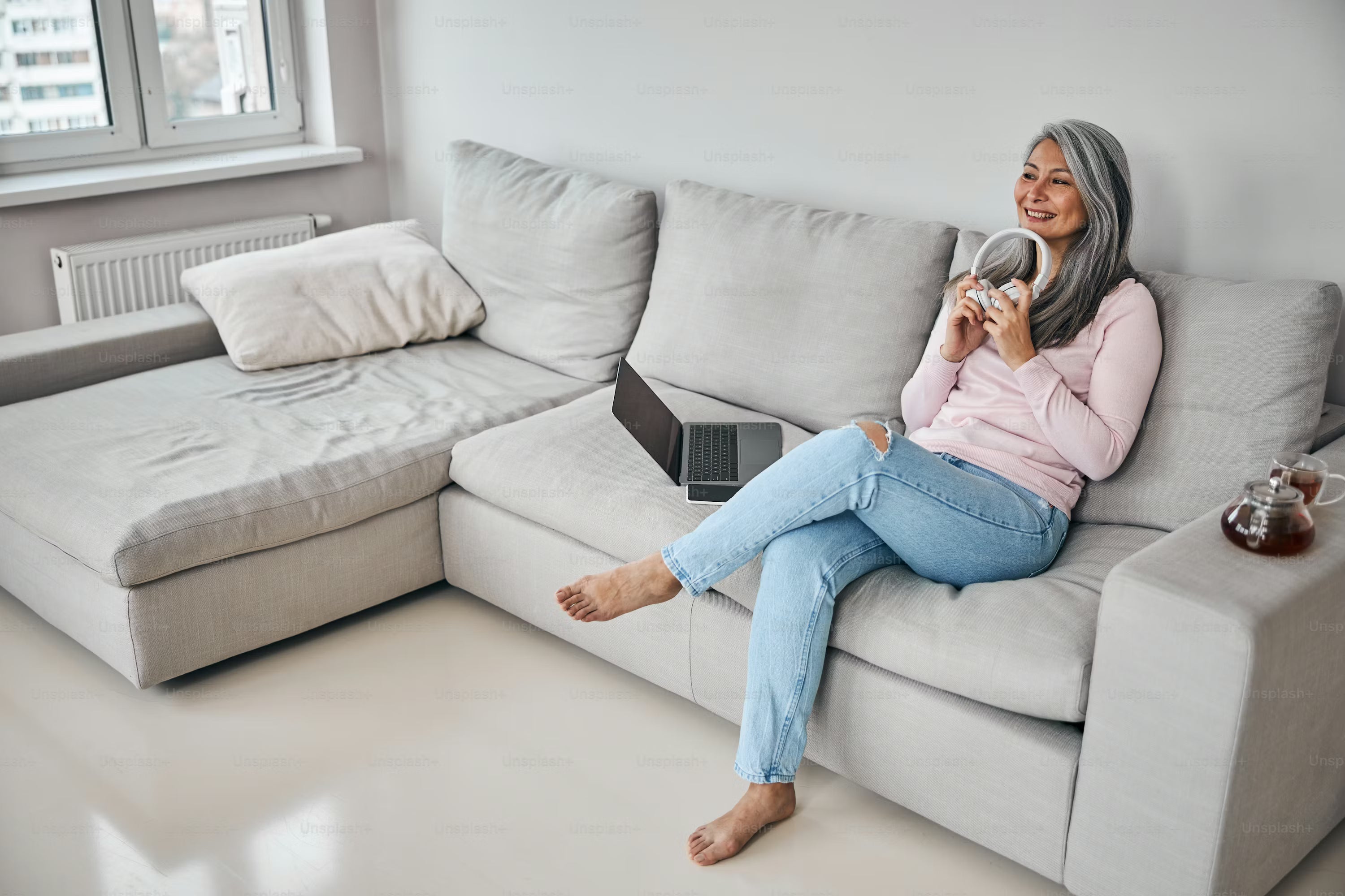 Person comparing a seated foot care device for daily foot support at home