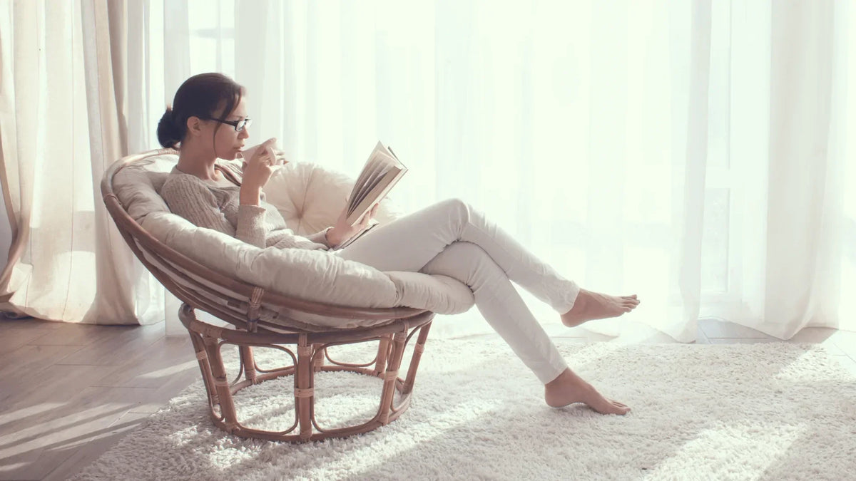 Person using a seated foot care routine at home