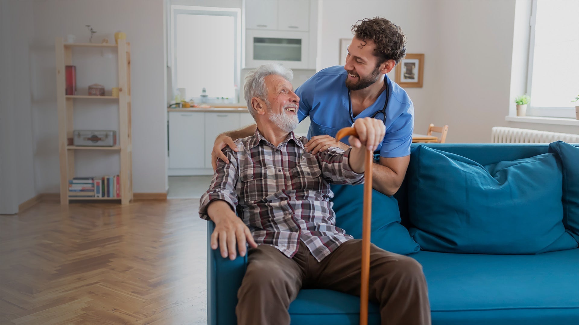 Older man using a simple foot care routine with family support